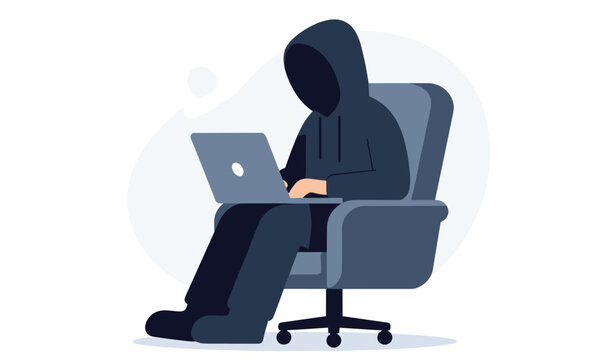 Mysterious cybersecurity hacker wearing a dark hoodie sitting in an office chair and typing on a laptop computer.