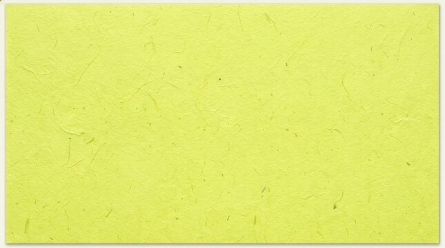 Light yellow textured handmade paper background surface for banner design