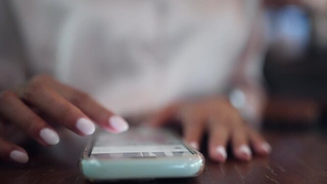 Professional woman interacting with a smartphone for business communication and digital productivity. Suitable for office technology, mobile applications, online collaboration, social media, and conne