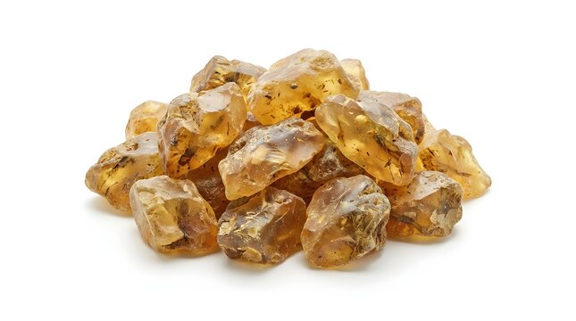 Heap of raw unpolished amber resin chunks with natural golden translucency for gemology science research and jewelry making concepts