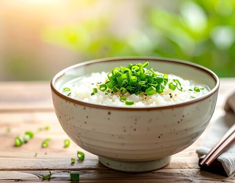 Japanese seven herb rice porridge nanakusa gayu in a ceramic bowl on a wooden table