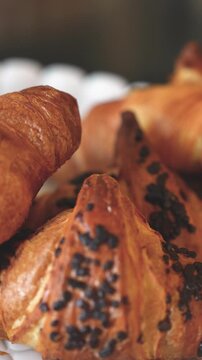 Assorted cornetti displayed for breakfast with crispy layers and gourmet presentation