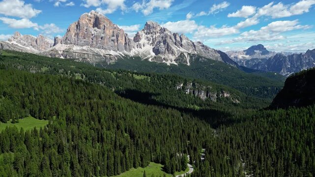 Giau Pass drive with mountains in Italy Dolomites by drone