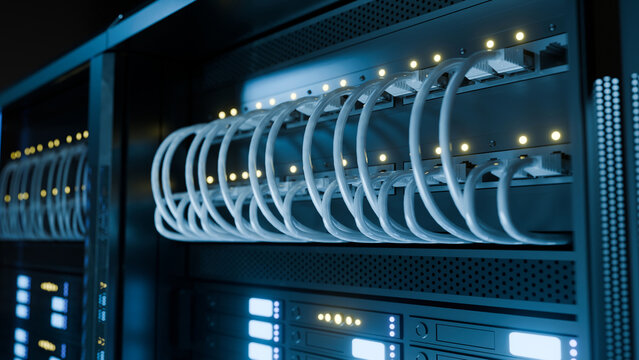 Data Center Server Rack with White Ethernet Cables and Glowing LED Lights in Blue Lit Network Room