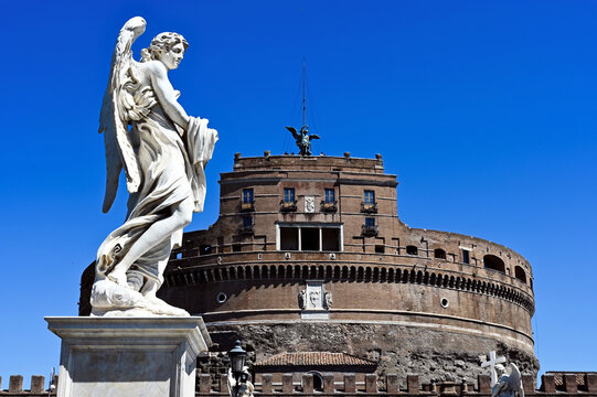  the Castel Sant'Angelo or Castle of the Holy Angel in Rome, Italy. brick and stone castle. landmark building. brick bastion. Emperor Hadrian mausoleum. white stone sculpture. tourist attraction