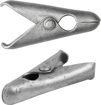 Pair of vintage 1960s-1970s metal clothes pegs with scratched textures isolated on transparent background
