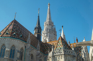 Naklejka premium Colorful glazed Zsolnay ceramic roof tiles of Matthias Church in Budapest, Hungary