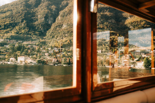 Como Village Through Wooden Boat Window