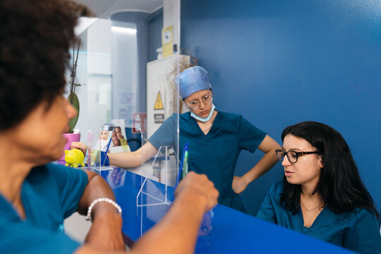 Medical Staff at Reception Desk