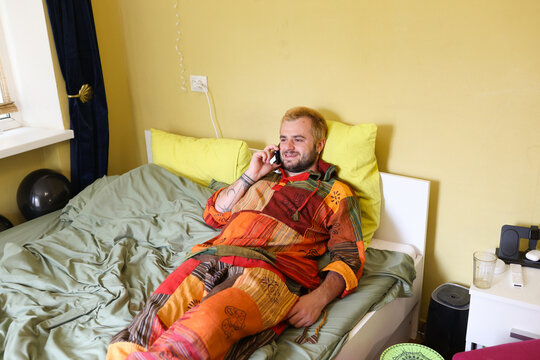young man talking on the phone