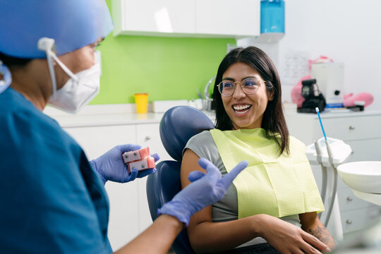 Dentist Explaining Treatment to Patient