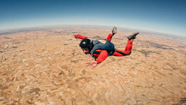 Solo skydiving experience over rural terrain