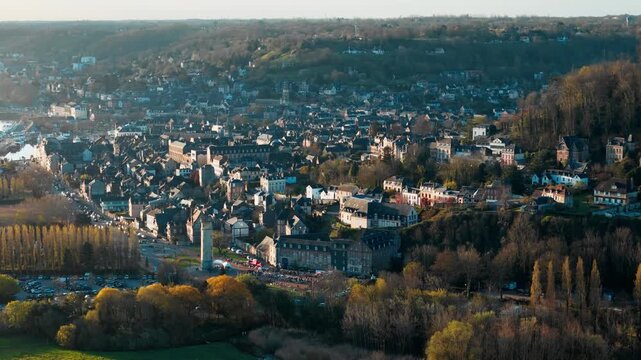 Honfleur urban landscape with old town, hillside neighborhoods. Drone footage of Normandy cityscape