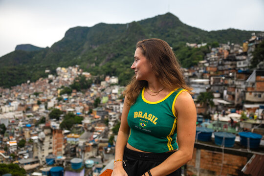 Woman admiring the view over Rocinha in Rio de Janeir