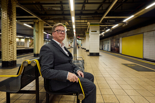 Man waits for an underground train