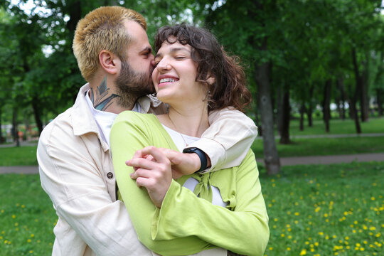 young couple walking in the park