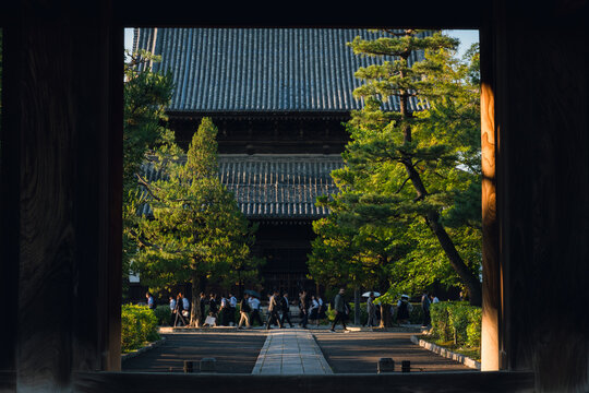 Visitors walk in Kyoto during summer season