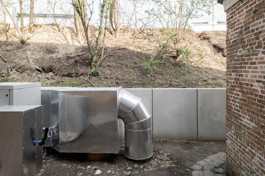 heat pump and brick wall