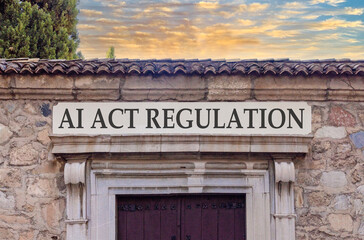Fototapeta premium AI act regulation words symbol. Concept words AI artificial intelligence act regulation on beautiful white sign plate. Beautiful stone wall background. Business AI act regulation concept. Copy space.