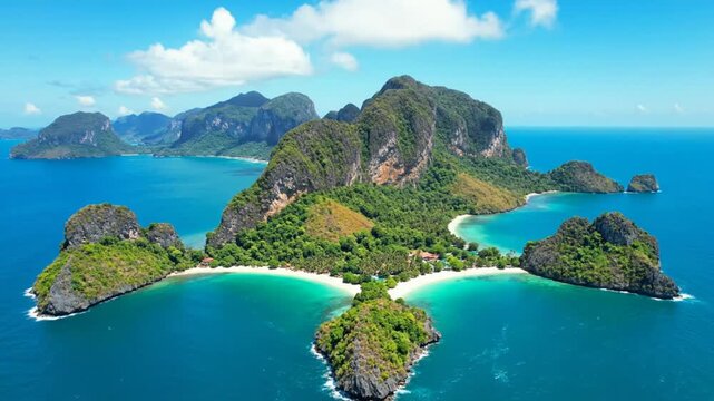Breathtaking aerial view of a tropical island paradise with lush greenery and crystal clear turquoise waters under a sunny blue sky