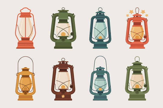 Una colecci&oacute;n de linternas de aceite de estilo vintage en varios colores y aisladas sobre un fondo claro