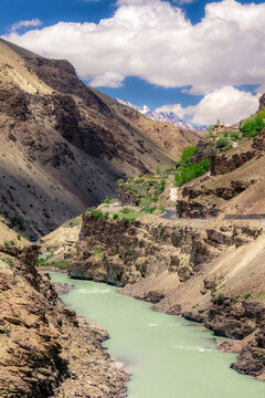 Turquoise River Flowing Through Rugged Mountain Canyon along Winding Road, Scenic High Altitude River Valley in Zanskar Ladakh India