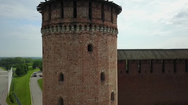 Drone takes off rotating beside the Kolomna Kremlin tower