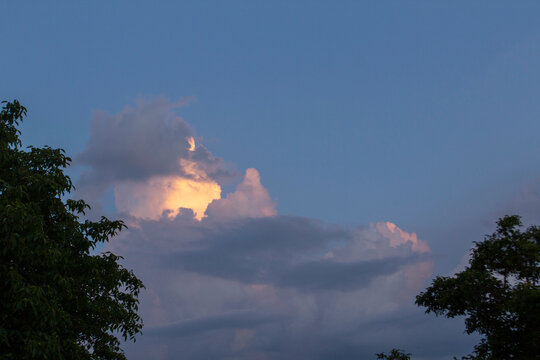 Sunset Sky Over Rural Moldova with Utility Wires and Silhouetted Trees