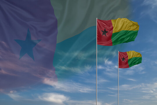 Card for Independence day National flags of Guinea Bissau waving in sky