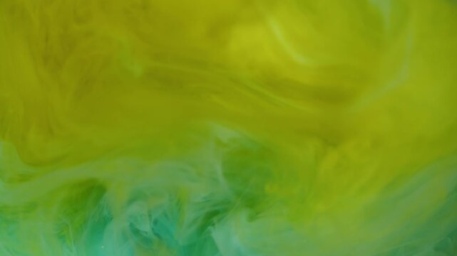 Haze wave defocused. Mist swirl. Green yellow smoke blending color abstract background. Paint pigment fluid floating vapor whirl texture.