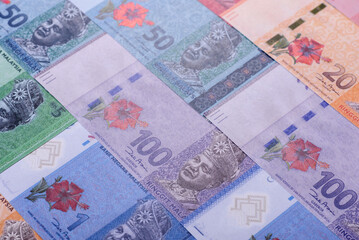 Malaysian ringgit banknotes as a tool for trade and financial transactions. The Malaysian ringgit © chernikovatv