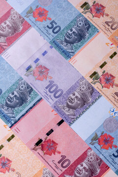 Malaysian ringgit banknotes as a tool for trade and financial transactions. The Malaysian ringgit