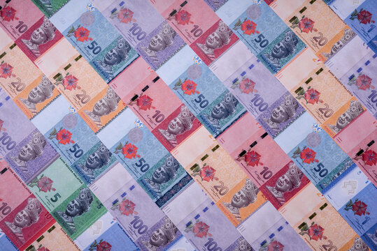 Malaysian ringgit banknotes as a tool for trade and financial transactions. The Malaysian ringgit