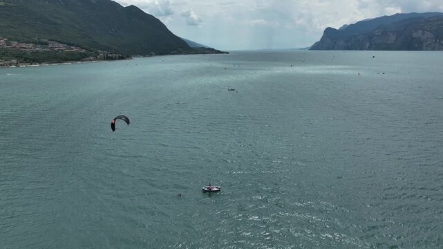 Kite surfing on Lake Garda in Italy with action and excitement on the water