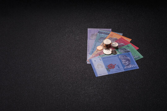 Malaysian ringgit banknotes as a tool for trade and financial transactions. The Malaysian ringgit