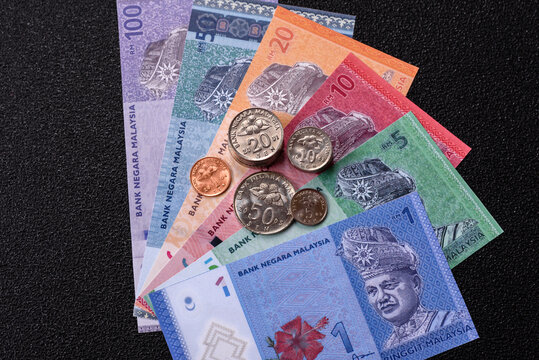Malaysian ringgit banknotes as a tool for trade and financial transactions. The Malaysian ringgit