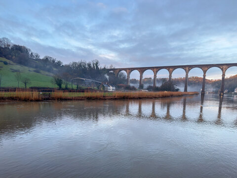 Calstock, Cornwall, England, UK &ndash; July 1, 2026: The historic Calstock Viaduct spanning the River Tamar in Cornwall on a summer morning overcast day