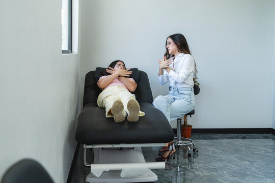 Therapist guiding patient through emdr butterfly hug technique
