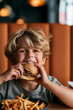 child enjoying a delicious burger, happy kid eating a hamburger, cheerful child enjoying a tasty meal