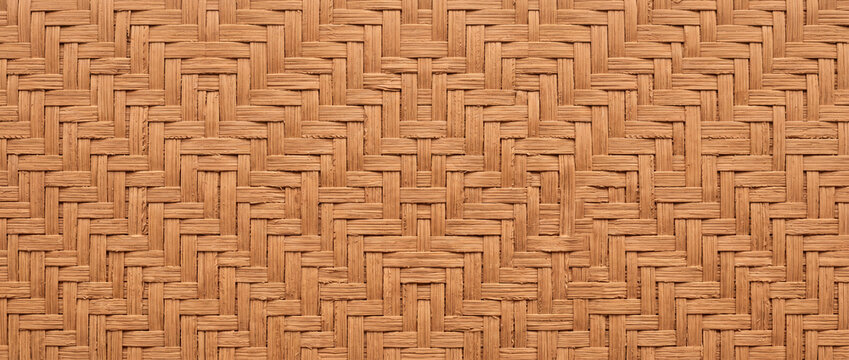 Natural woven bamboo texture background with traditional wicker craft pattern
