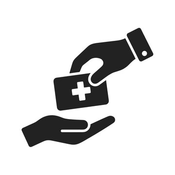 Medical card is being handed from one person to another to represent professional healthcare service delivery.