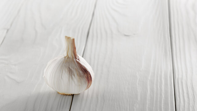 garlic healthy food on a wooden background