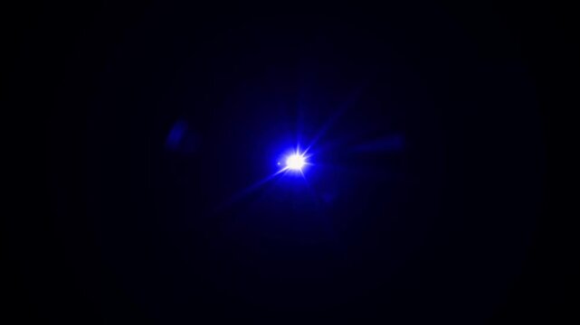 abstract light rays emanating from a center light source over a starry ,optical lens flare shine light animation on black background. Explosion lights optical flare transition, light moving 