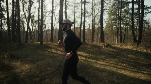 Runner Jogging In Forest Trail. Outdoor Training. Morning Exercise