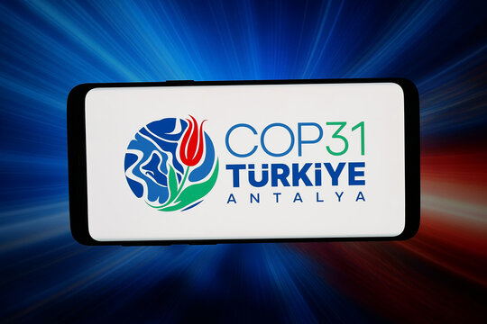 Stuttgart, Germany - 07-17-2026: In this photo illustration, the logo of 2026 UN climate change conference COP31 is displayed on a smartphone in front of abstract background on computer screen.