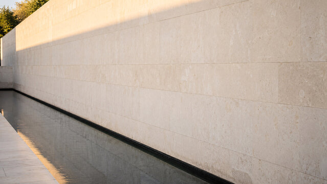 Beige Tiled Wall with Soft Architectural Shadow