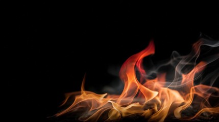 Fototapeta premium Dynamic flames and smoke swirling against a dark background create a captivating visual effect, showcasing the power and allure of fire in a mesmerizing display of colors and movement