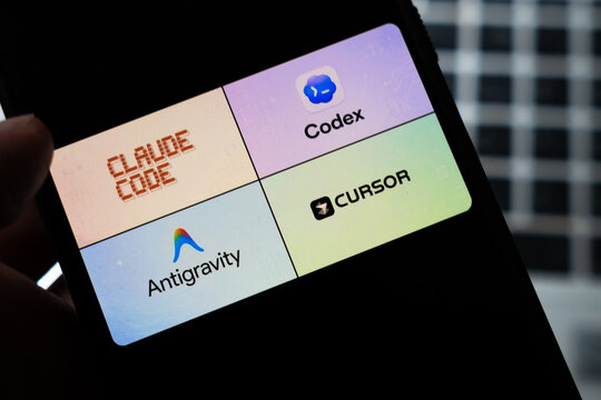 Warsaw, Poland - July 26, 2026: Claude Code, Codex, Cursor and Antigravity AI coding assistant apps displayed on smartphone screen representing competitive AI developer tools market