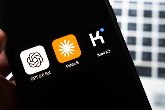 Warsaw, Poland - July 26, 2026: ChatGPT, Claude and Kimi K3 AI assistant app icons displayed on smartphone screen, showing competing artificial intelligence platforms