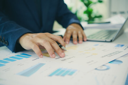 Financial analysis reports with business professional reviewing charts and performance data to evaluate results guide investment decisions improve planning and support strategic growth.